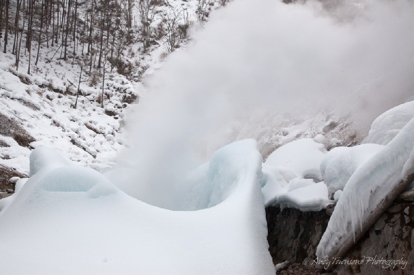A snow covered vent erupts with steam in the Joshinetsu Kogen National Park.