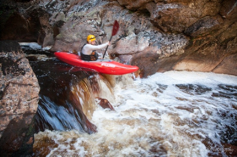 Negotiating a waterfall on a section of the Crossing river.