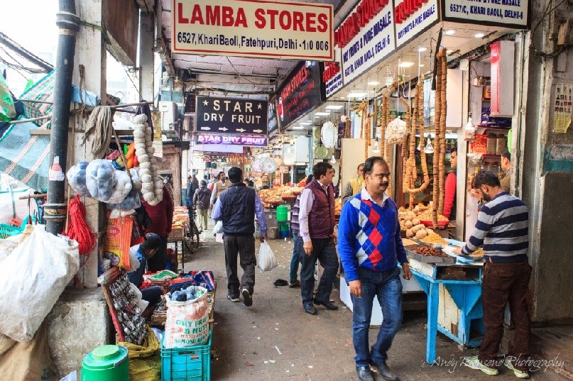 A busy street thoroughfare near the wholesale spice market in Old Delhi.