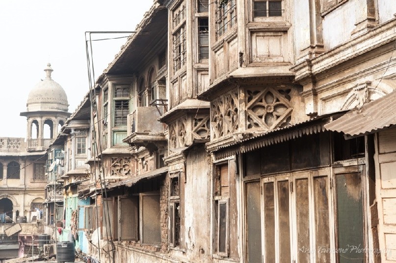 A detailed view of timberwork at the edge of the wholesale spice market in Delhi.