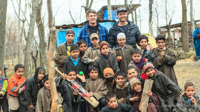 The local backyard cricket team enjoys a portrait in Heer.