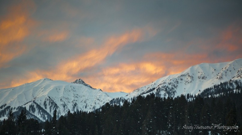 The last of the evening light catches high clouds above the Gulmarg mountain ranges.