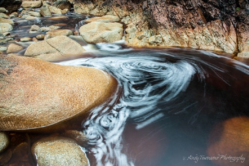 A slow exposure of this creek bed excentuates a layer of bubbles in the Tarkine.